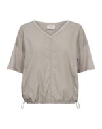 kortærmet beige bluse med justerbar snøre i bunden