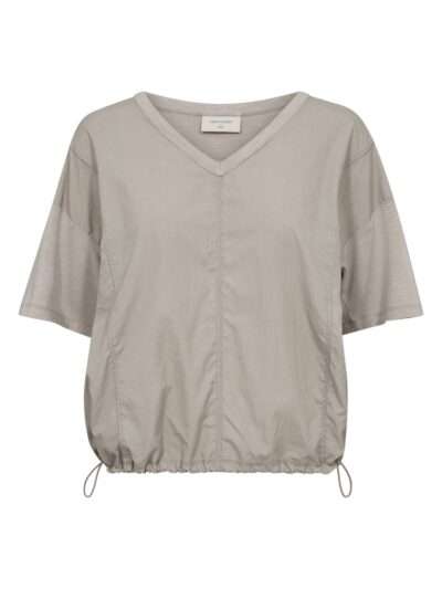 kortærmet beige bluse med justerbar snøre i bunden